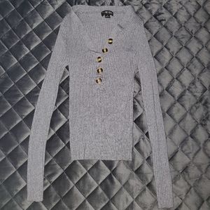 Long sleeve with buttons down the middle